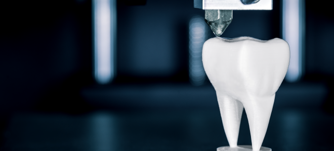 Image of 3D printer printing a tooth