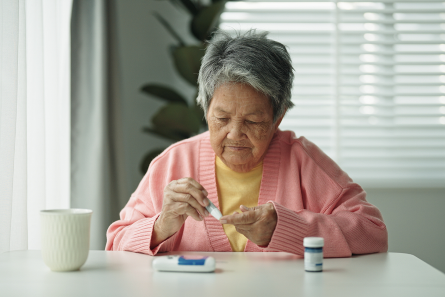 Person checking their blood sugar.