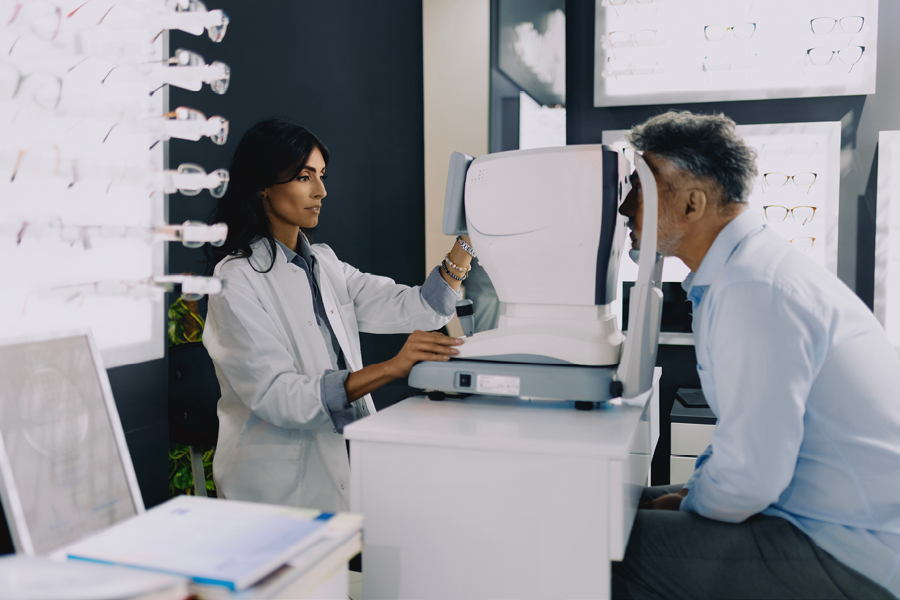 Person getting an eye exam at the eye doctor.