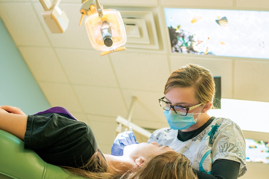 Dentist working on a child