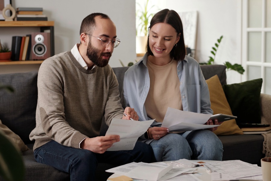 man and woman reviewing documents