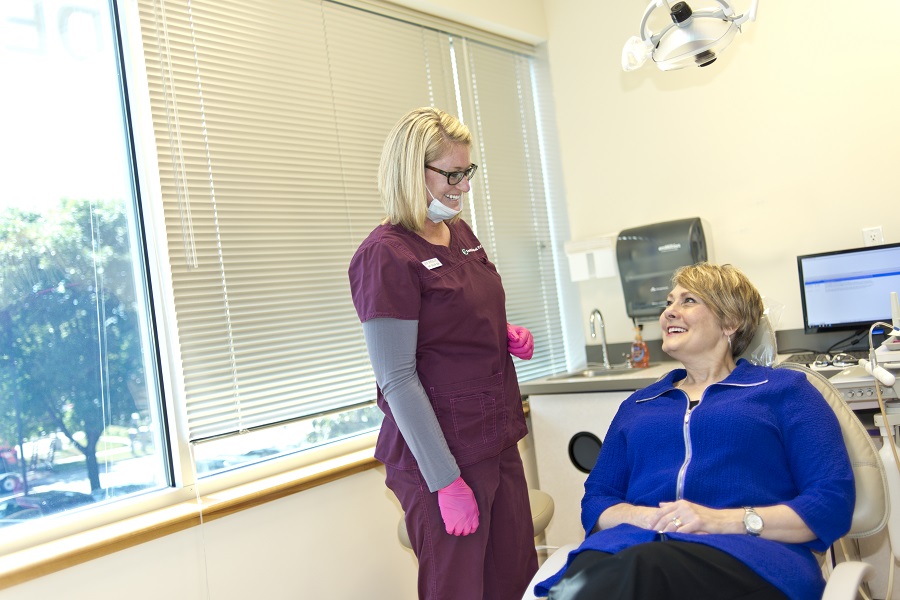 Patient and dentist having conversation