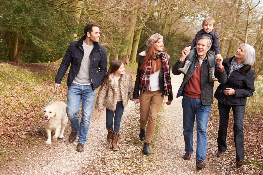 Family on a walk with their dog