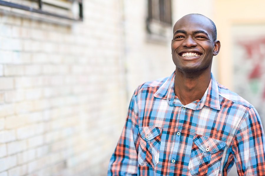 Man smiling outside