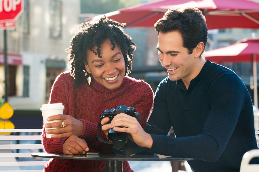 two friends looking at a phone