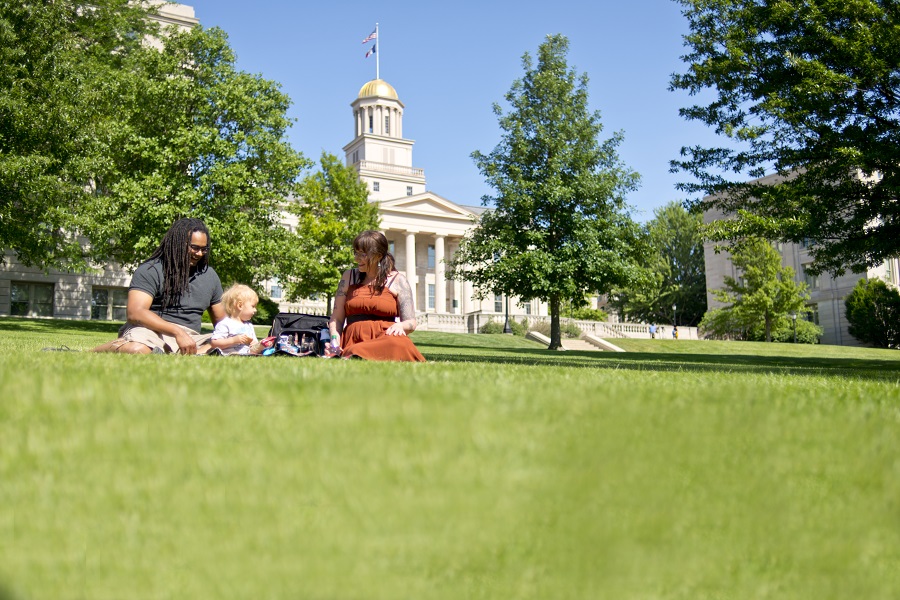 Family sitting in the grass