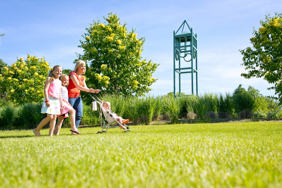 Mother walking with her children