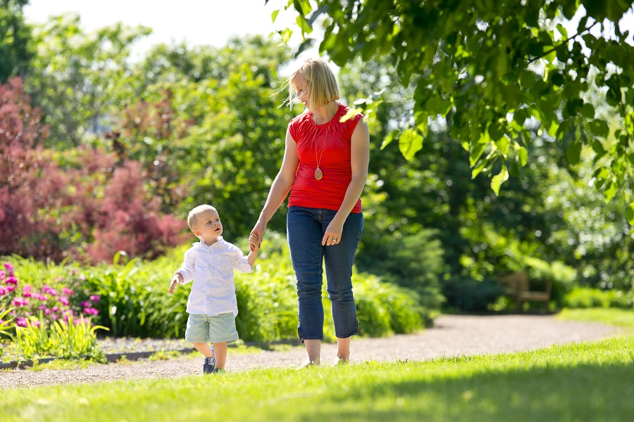 Mom on a walk with toddler