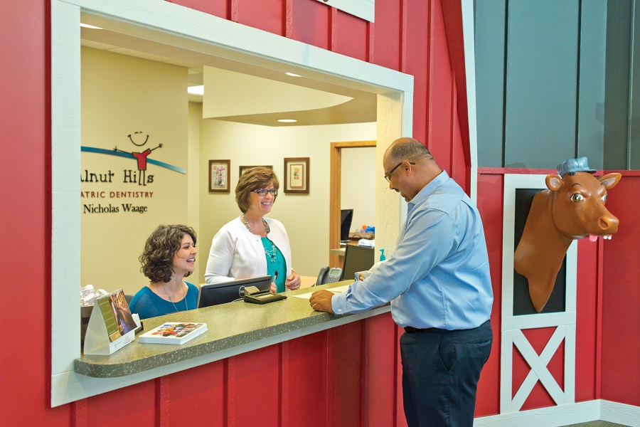 Man standing at front dentist