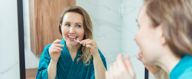 woman flossing