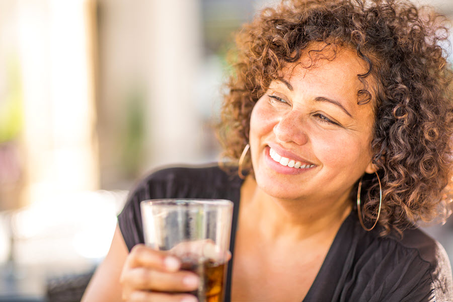 Woman drinking soda