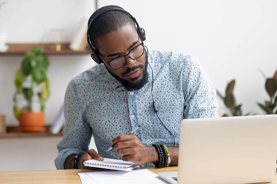 man looking at computer screen