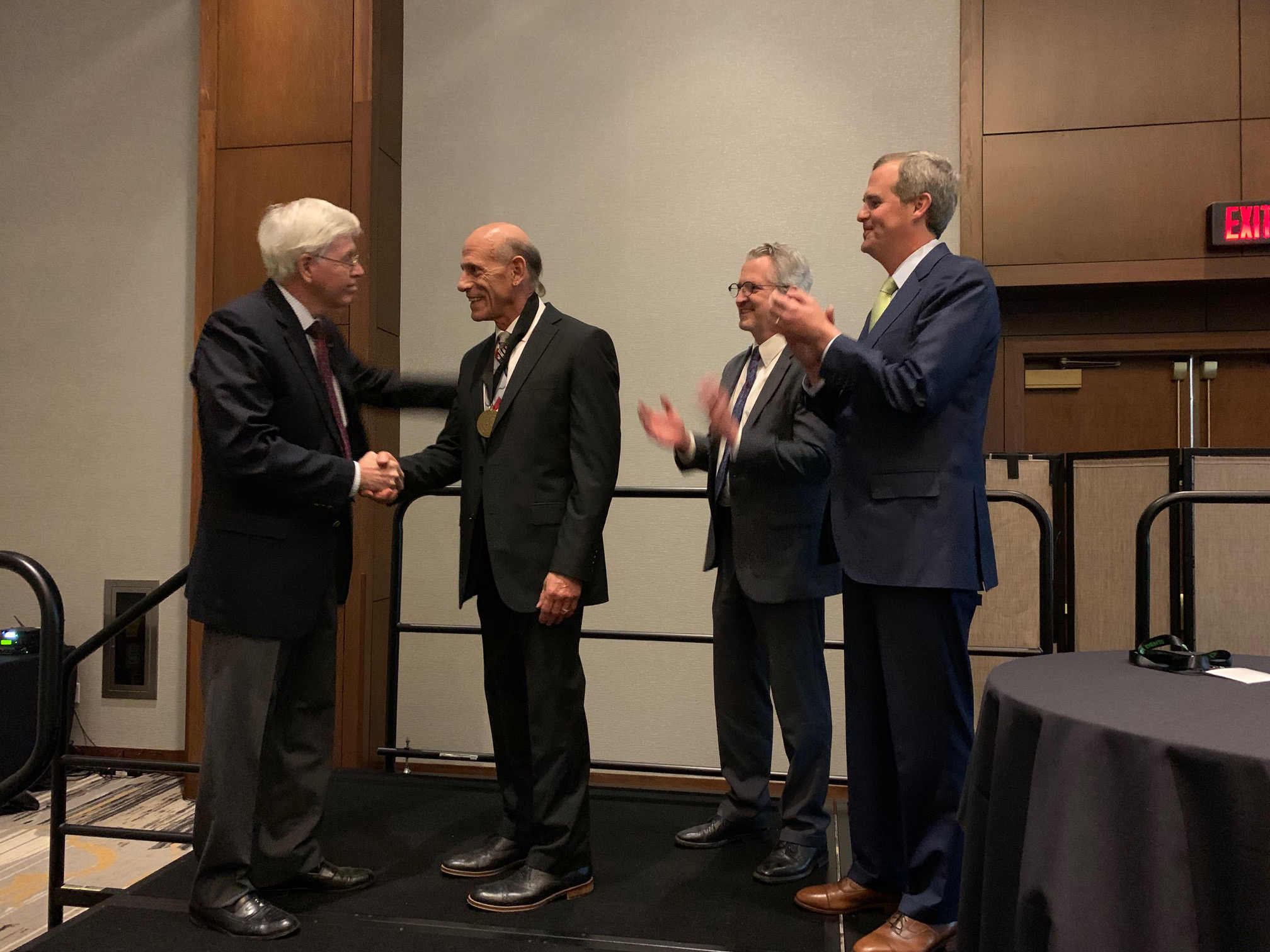 Dr. Howard Cowen shaking hands