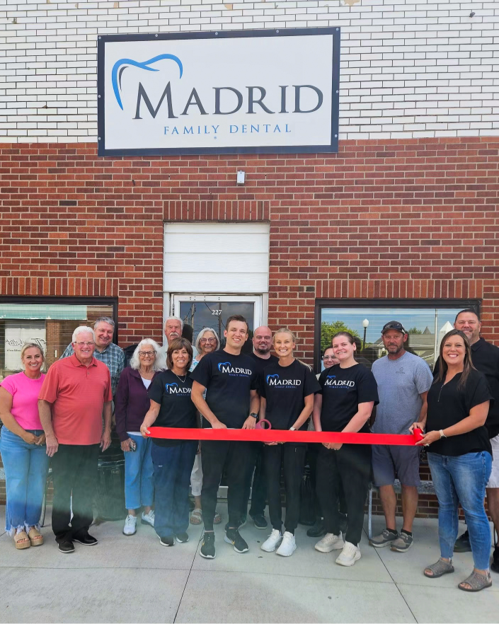 Dr. Odden and his team at the opening of his clinic in Madrid, IA.