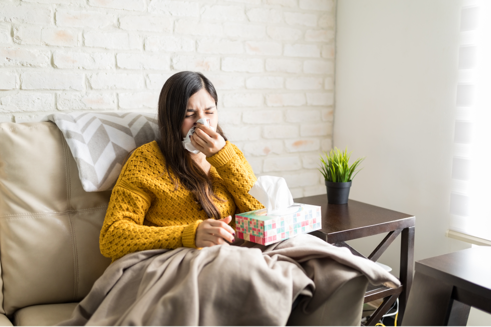 woman sneezing