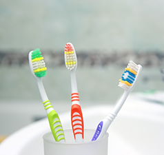 Toothbrushes in holder
