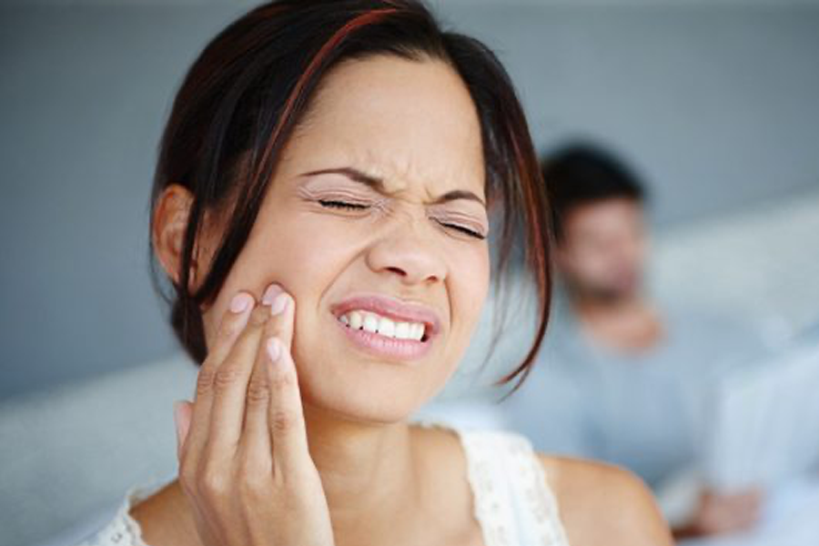 woman with tooth ache