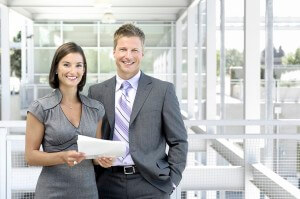 Business Man & Woman Standing smaller