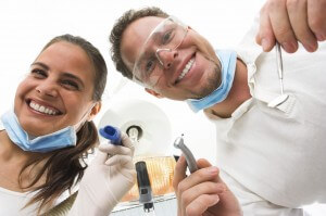 Dentist and Hygenist with Tools
