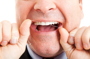 flossing male