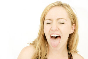woman sticking out tongue